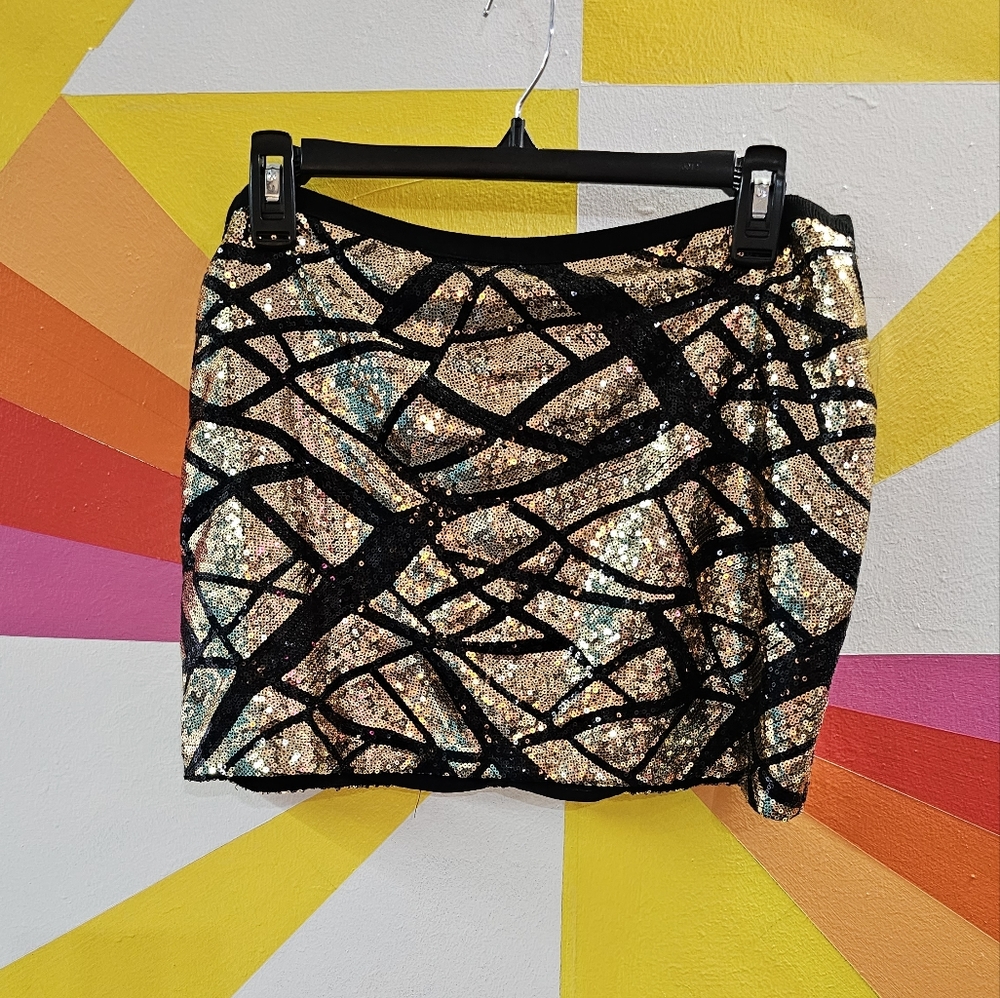 Moda international gold and black sequence mini skirt with zipper closure, sz 10